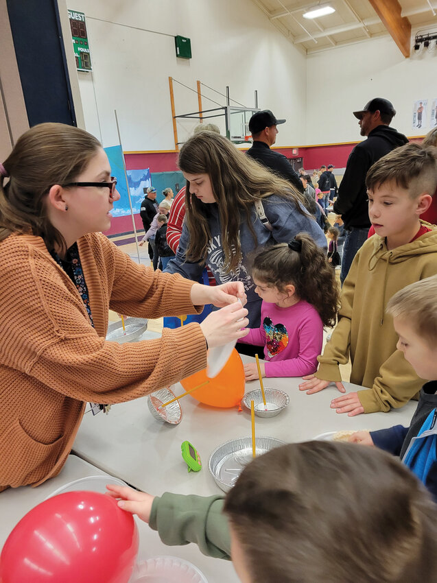 STEAM-themed activity stations throughout the school taught participants about the sky and atmosphere.