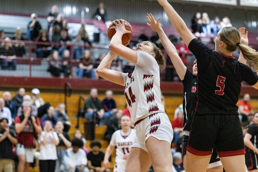 W. F. West&rsquo;s Julia Dalan goes for a layup against Archbishop Murphy during a Class 2A opening round girls basketball contest on Friday night at W.F. West High School. Dalan scored a game-high 22 points and pulled down 11 rebonds for the Bearcats.