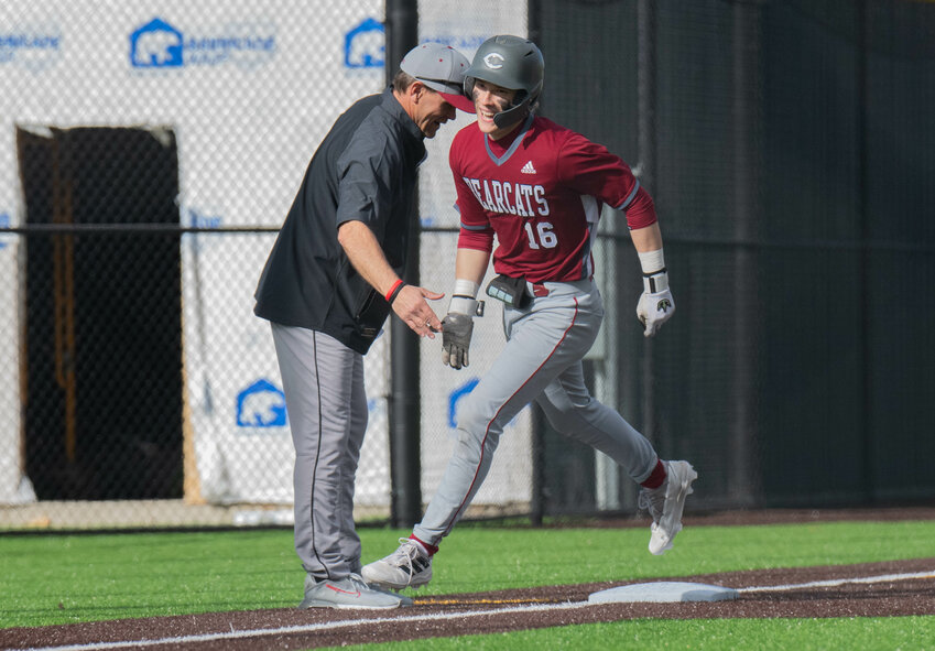 Deacon Meller celebrates on his way to home plate after hitting a home run during W.F West's 4-2 win over Timberline on March 12.
