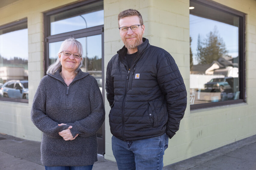 Patty Howard, associate pastor of Gather Church, left, Cole Meckle, pastor of Gather Church stand outside at Gather Church&rsquo;s drug treatment clinic on Thursday, March 14.