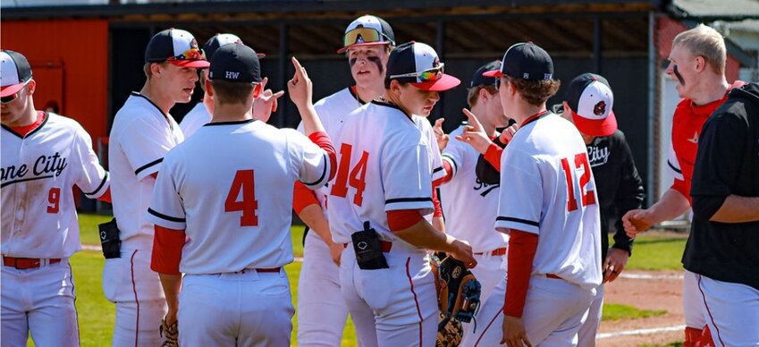 The Tenino Beavers break a team huddle during a regular season game at Tenino High School.