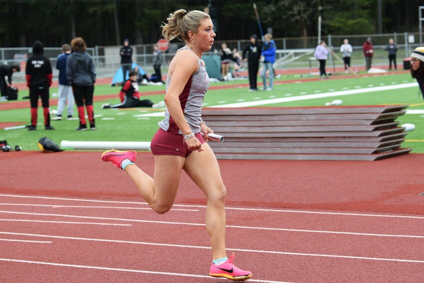 W.F. West&rsquo;s Lauren Kelley races in a relay during a five-team meet at Shelton on March 28.