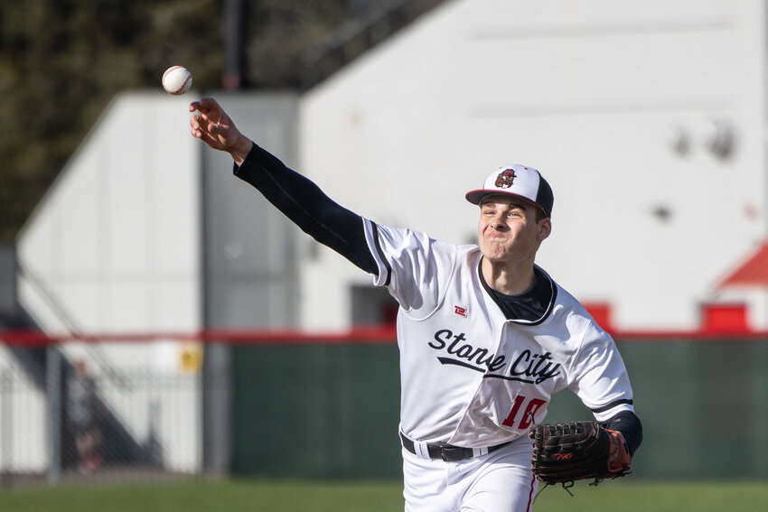 Tenino&rsquo;s Jack Burkhardt throws a pitch during a high school baseball game at Tenino High School on Tuesday, April 9.