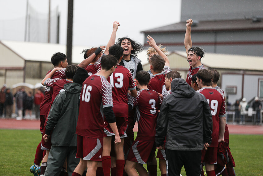 The W.F. West Bearcats celebrate after their 2-0 win over Hudson's Bay in the 2A District 4 Quarterfinals on May 4.
