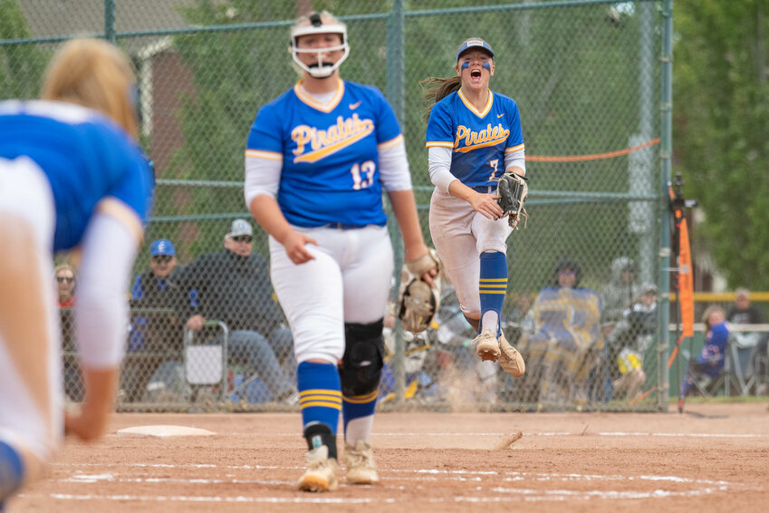 Alyssa Carroll (right) jumps in the air after a big play during Adna&rsquo;s 2B State Softball championship win over Warden at Gateway Sports Complex in Yakima on Saturday, May 25, 2024.