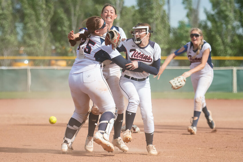 Titan players celebrate after PWV&rsquo;s 2B State Softball Third-Place game win over Kittitas at Gateway Sports Complex in Yakima on Saturday, May 25.