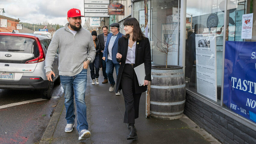 Congresswoman Marie Gluesenkamp Perez smiles while touring Tenino with Chehalis Tribe Chairman Dustin Klatush in June 2023.