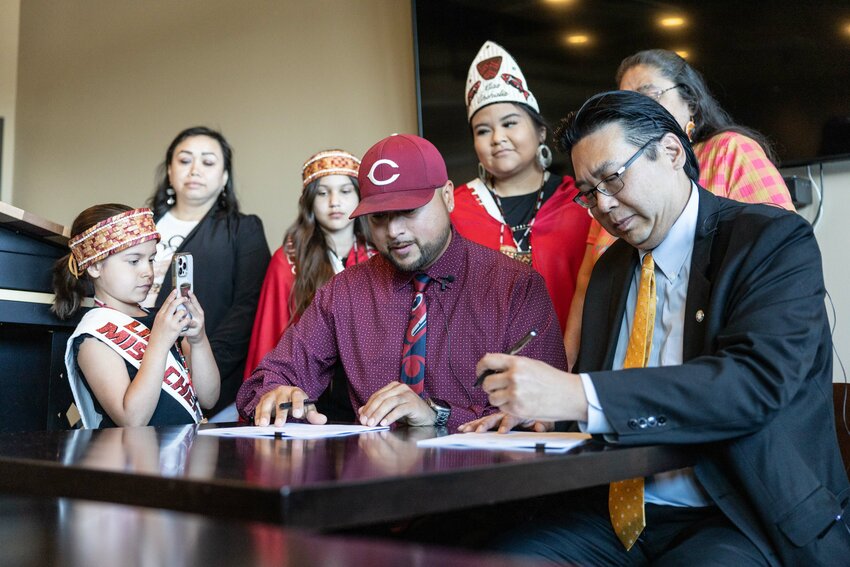 Confederated Tribes of the Chehalis Reservation Chairman Dustin Klatush and Department of Commerce Director Mike Fong sign the first memorandum of understanding (MOU) between the Tribe and Commerce at Talking Cedar distillery brewery in Rochester on Thursday, June 6.