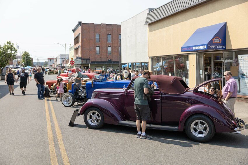 People browse the car show during ChehalisFest on Saturday, July 27.