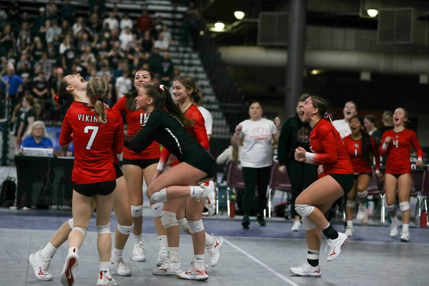 The Vikings celebrate after scoring a point during their semifinal loss at the state tournament on Nov. 9, 2023 in Yakima.