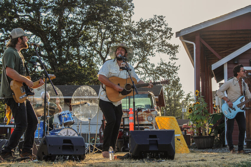 From left: Luke Olson, Kesler Blair, Isaac Olson and Johan Stone perform a song at the Hope for Wild Hearts Rockin' Country Music Gala at the Lacamas Valley Ranch on Aug. 16.