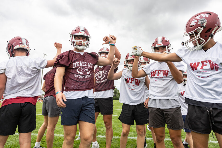 W.F. West players break after a drill during the first day of football practice at W.F. West High School on Wednesday, Aug. 21.