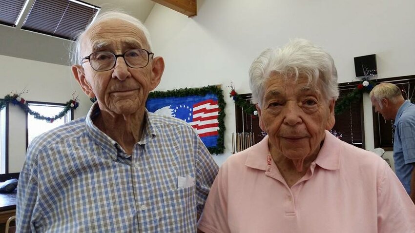 Esther Borte is pictured with Cy Meyer at the Toledo Senior Center in July 2014.
