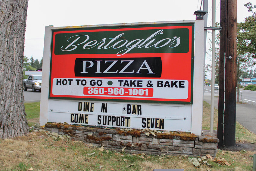 The sign for Bertoglio's Pizza shows support for Seven Bertoglio on Sept. 10.