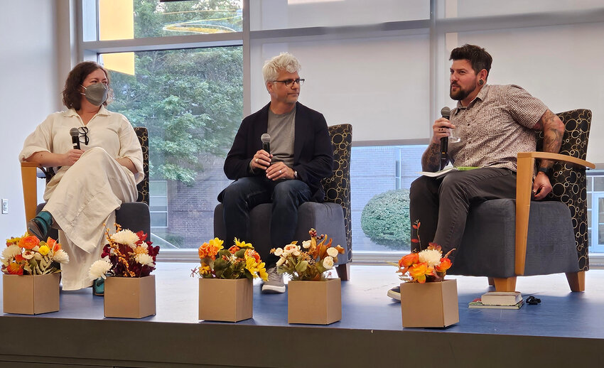 Speakers Olivia Hawker, Garth Stein and Matt Young are pictured on stage in this photo provided by Sandy Crowell.
