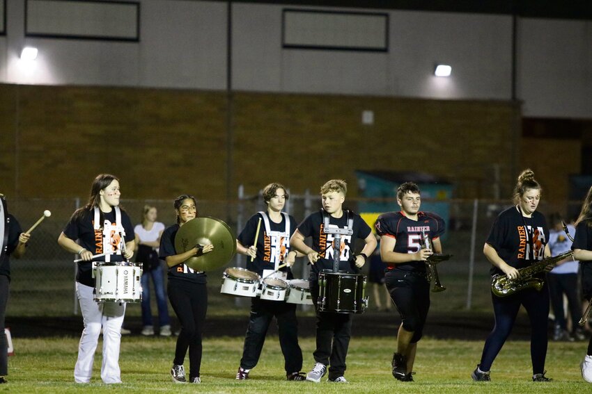 Members of the Rainier High School marching band perform at the Mountaineers' home football game against Tenino on Sept. 6.