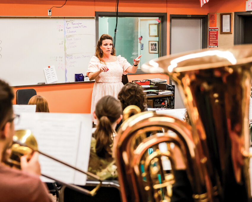 Danielle Armstrong, Battle Ground High School’s new band director, fills in at base drum on Wednesday, Sept. 18, while the band practices their Oct. 25 halftime show performance for the homecoming football game.