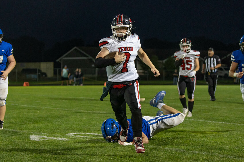 Pirate cheerleaders perform a stunt during Tenino’s 22-19 win over Adna at Adna High School on Friday, Sept. 20.