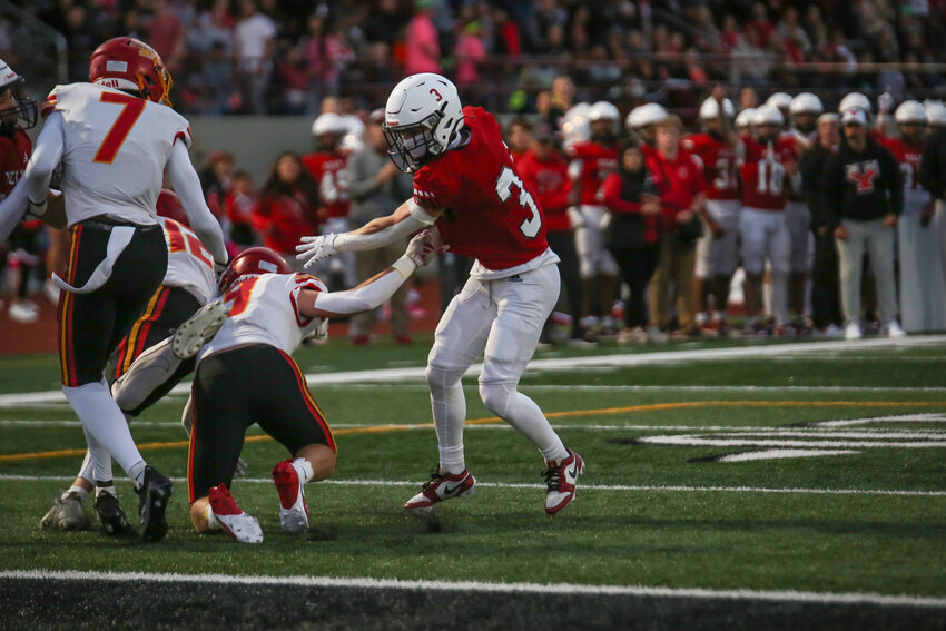 Yelm football players celebrate the Tornados' 52-48 win over Kamiakin on Sept. 20.