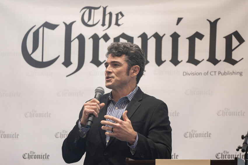 Former congressional candidate Joe Kent speaks during a debate hosted by The Chronicle in the TransAlta Commons at Centralia College on Thursday, Sept. 26.