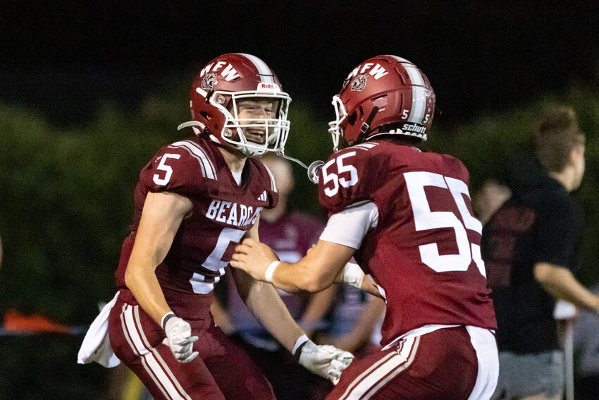 W.F. West's Beau Guyette and W.F. West's Andrew Snyder celebrate a touchdown during a high school football game against Shelton at W.F. West High School on Friday, Sept. 27.