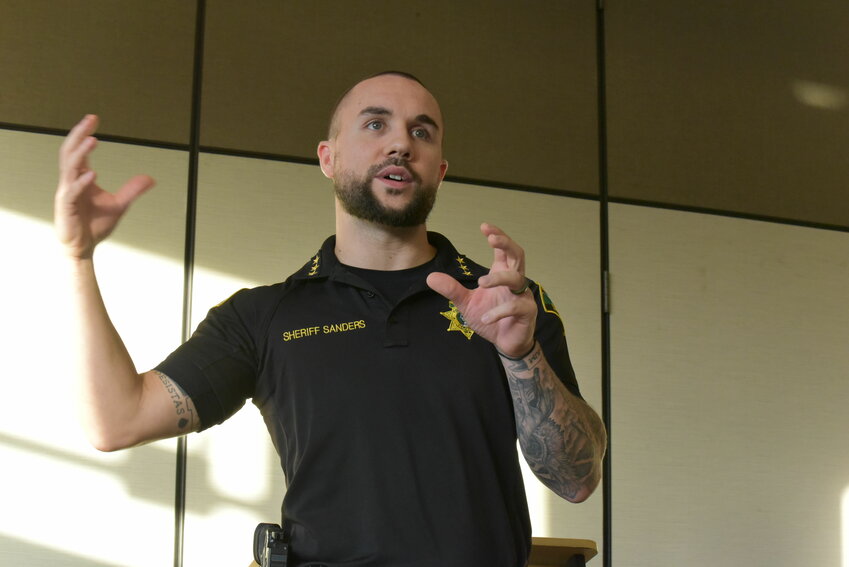 Thurston County Sheriff Derek Sanders speaks at a town hall in Yelm on Oct. 2.