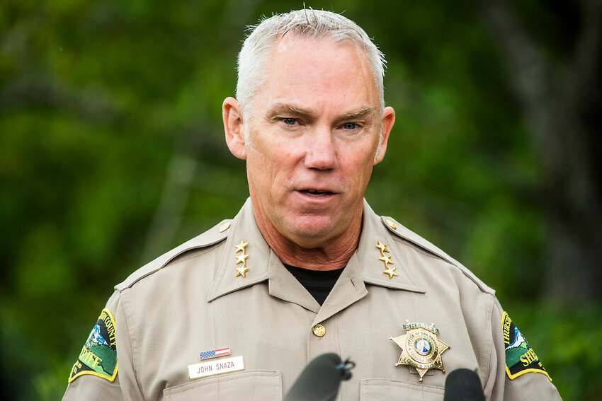 Sheriff John Snaza speaks at a press conference outside the Thurston County Courthouse in Olympia.