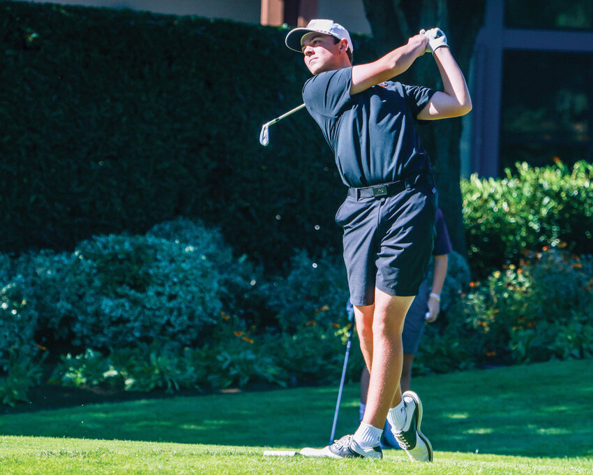 Battle Ground&rsquo;s Tommy Snitily hits his tee shot on Royal Oaks Country Club&rsquo;s hole one in the inaugural Clark County Cup high school golf tournament on Monday, Oct. 7 at the Royal Oaks Country Club in Vancouver.