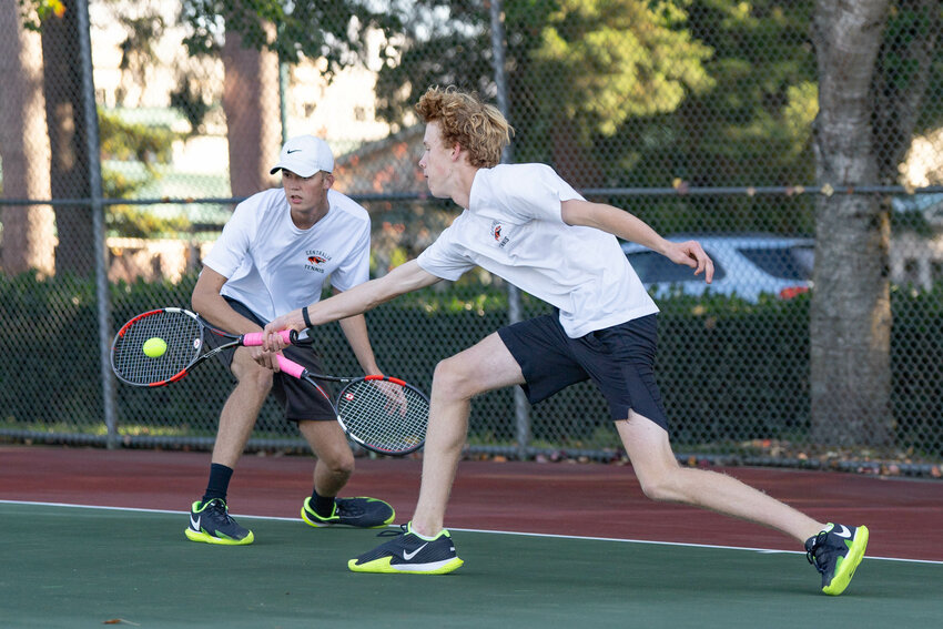 Centralia&rsquo;s Zander Corwin hits a ball during the 2A EVCO boys tennis sub-district tournament in Tumwater on Thursday, Oct. 17.