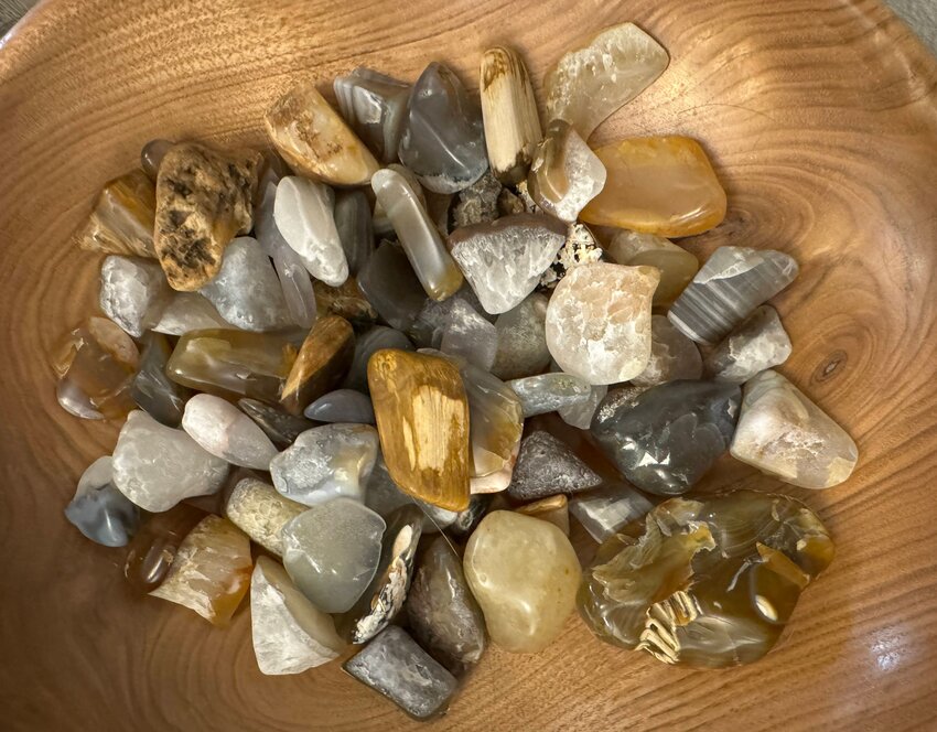 With the help of generous people who let him search for rocks in their creeks, and knowledgeable mentors like Rod Hudson, who taught him how to work with the raw materials, Sam Mittge polished these rocks and turned the wooden bowl in which they sit.