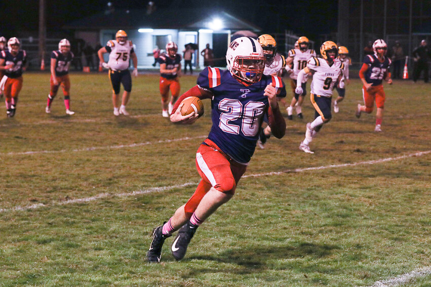 PWV's Cody Strozyk races up the sideline during PWV's win over Forks on Oct. 18.