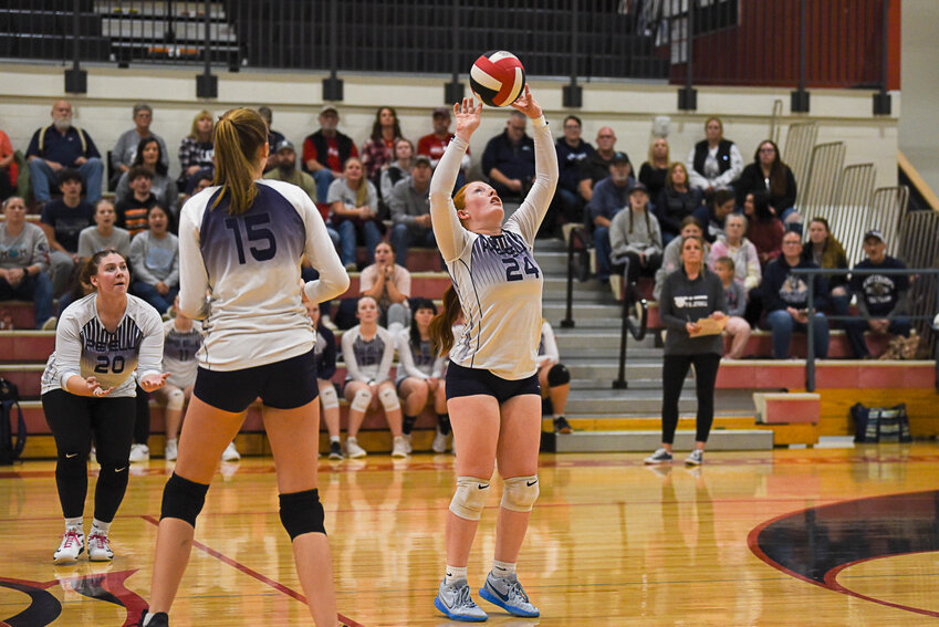 Pe Ell's Brookelynn King sets the ball for a teammate during Pe Ell's 3-0 win over Firm Foundation in a 1B District 4 Tournament Elimination Game at Toledo on Nov. 5.
