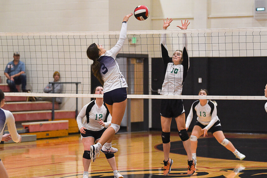 Pe Ell's Emma Kissner spikes the ball past a defender during Pe Ell's 3-0 win over Firm Foundation in a 1B District 4 Tournament Elimination Game at Toledo on Nov. 5.