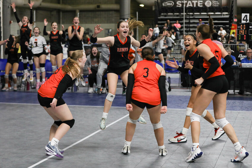 The Mountaineers celebrate after the final point in their 3-1 win over Liberty (Spangle) in the 2B Fifth-Place Game at the 2B State Volleyball Tournament in Yakima on Nov. 14.