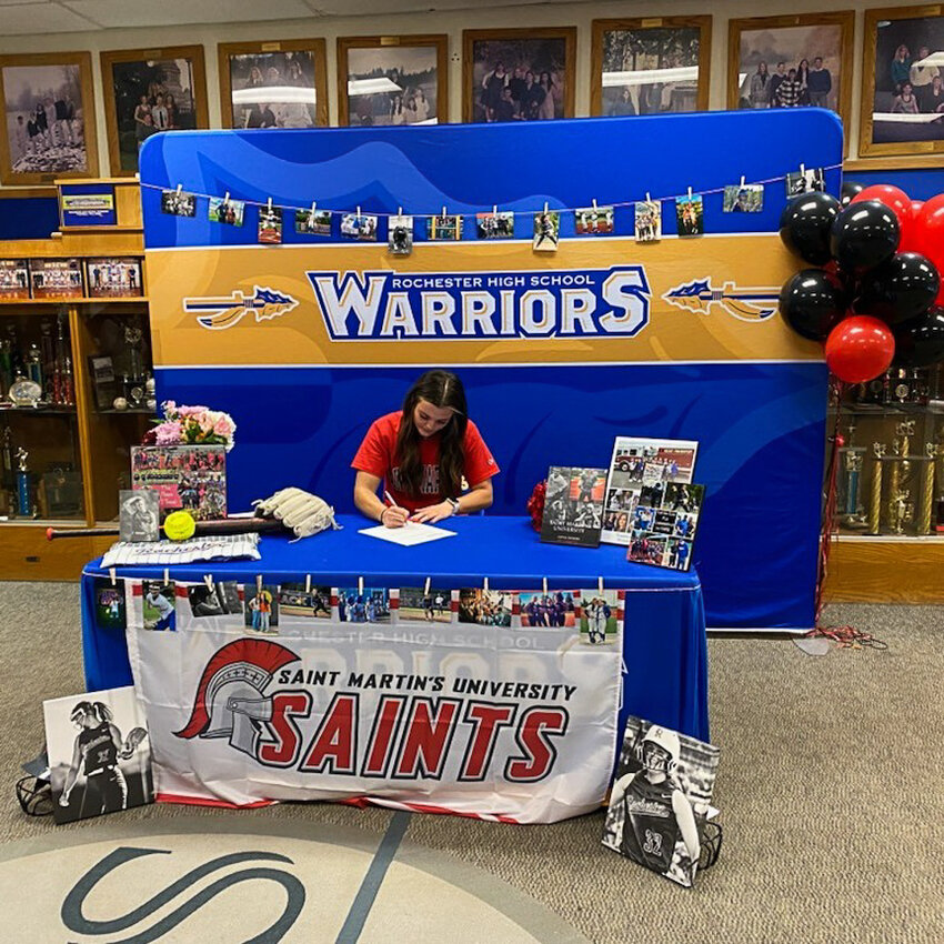 Rochester's Layna Demers signs her National Letter of Intent to play college softball at Saint Martin's University in a ceremony at Rochester High School.