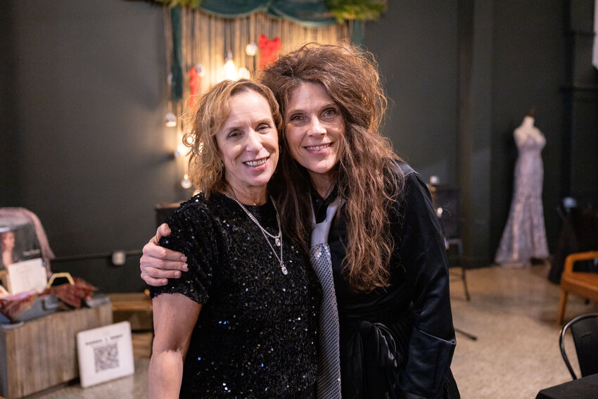 Paula Burrows, left, and Holly Ryan, owner of The Shady Lady antique and resale store and the founder of The Twirl Foundation, pose for a photo during the Twirl Foundation&rsquo;s Sparkle &amp; Shine event hosted at The Station LC Coffee Co. in Centralia on Thursday, Dec. 5.