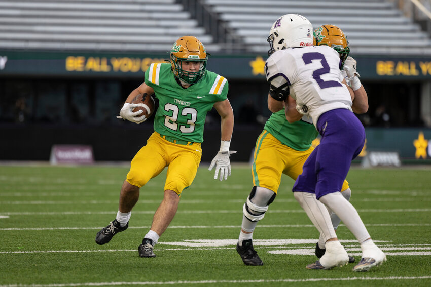 Tumwater's Cash Short runs the ball during the 2A State Championship against Anacortes at Husky Stadium in Seattle on Saturday, Dec. 7.