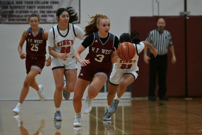 W.F. West's Dilyn Boeck dribbles up the floor during W.F. West's win over King's on Dec. 7.