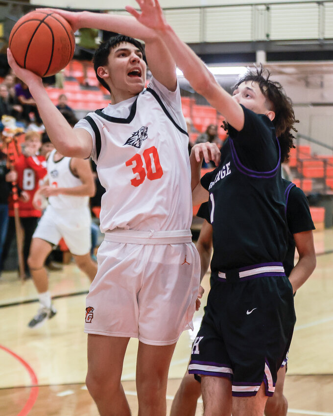Battle Ground&rsquo;s Treydyn Cornelison attacks the rim during his 20-point performance in the Tigers&rsquo; 62-54 win over Heritage High School on Thursday, Dec. 5.