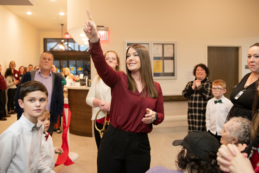 Administrator Ashley Hogue acknowledges her team during the Three Rivers Care grand reopening and ribbon-cutting in Centralia on Tuesday, Dec. 17.