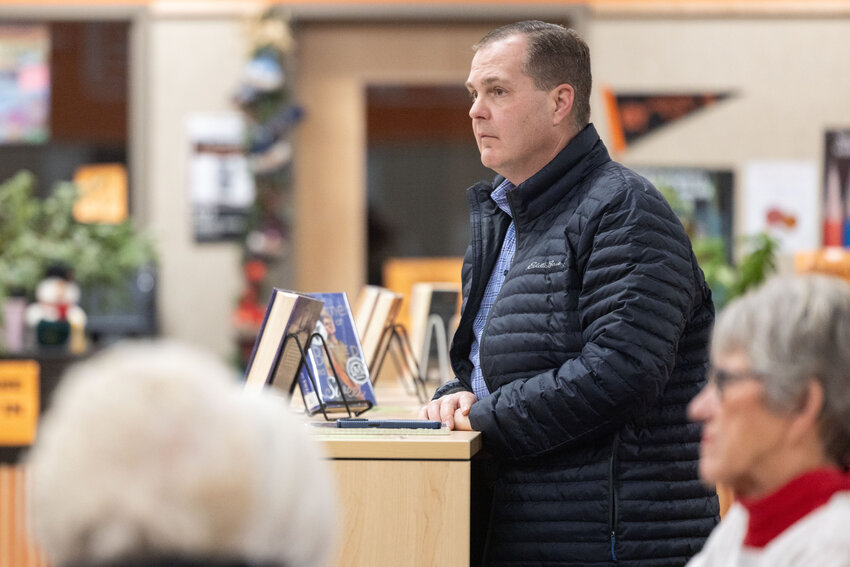 Sen. John Braun listens during a meeting in the Centralia High School library on Thursday, Dec. 19.