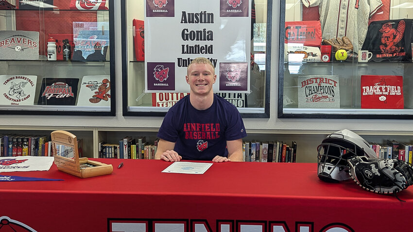 Tenino's Austin Gonia poses for a photo after signing his National Letter of Intent to play collegiate baseball at Linfield University.