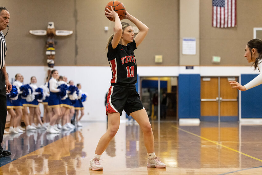 Tenino's Brianna Asay (10) looks to pass the ball during a girls basketball game at Rochester High School on Tuesday, Jan. 14.