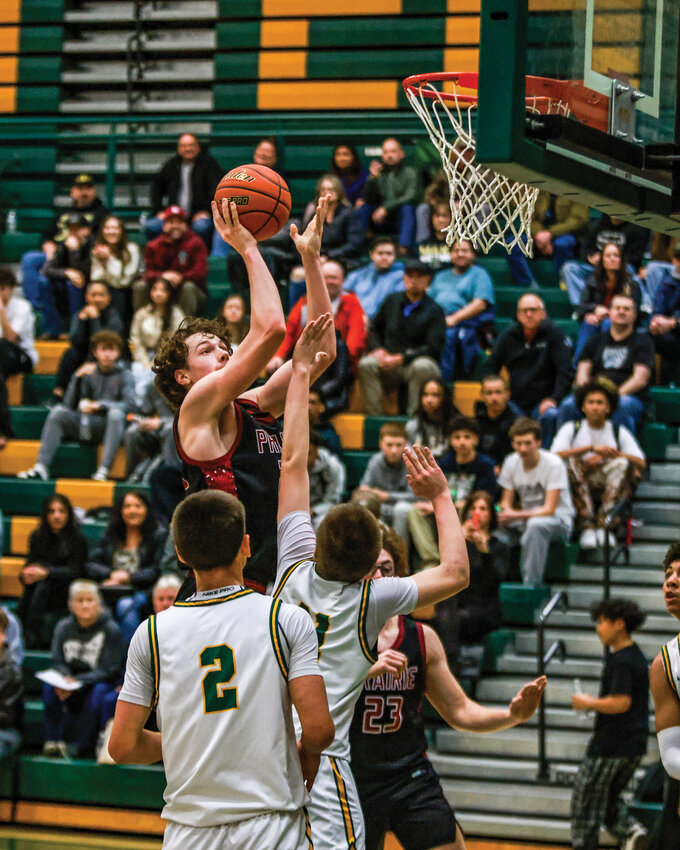 Prairie junior forward Carson Morningstar dropped 30 points in the Falcons&rsquo; close 67-65 win over Evergreen High School on Wednesday, Jan. 22.