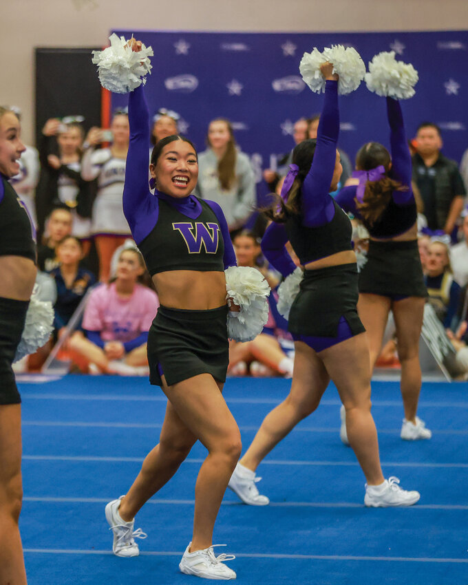 The University of Washington Huskies cheer squad performs an exhibition at the 2025 Washington Interscholastic Activities Association State Cheer Championships on Saturday, Jan. 25. The Huskies arrived at Battle Ground High School fresh off of their third-place win in the 2025 Division 1A Spirit Program Game Day category at the College Cheerleading and Dance Team National Championship. The third-place win marked the first medal in program history.