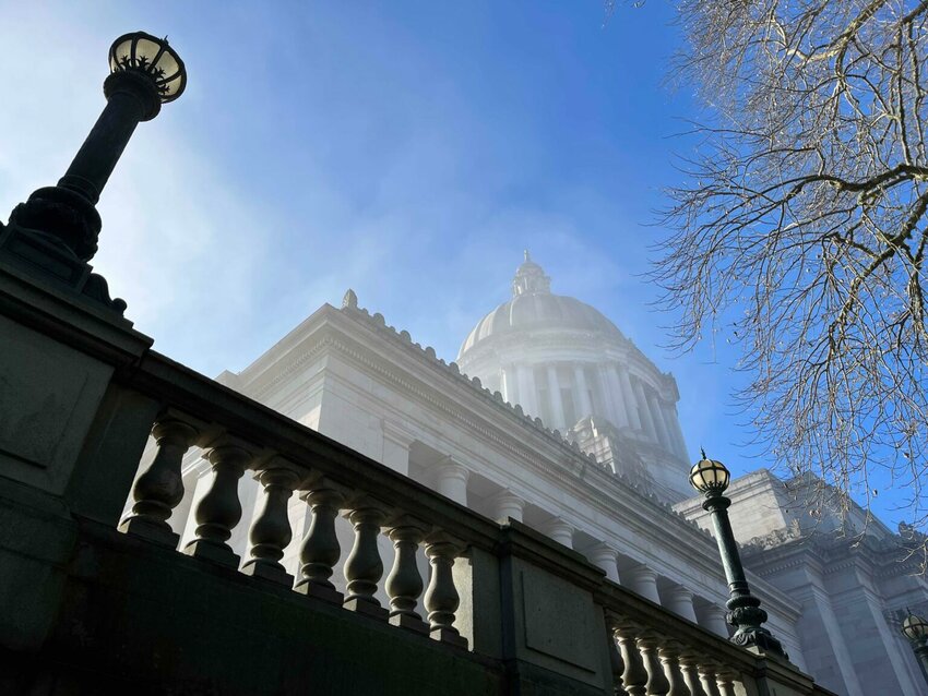A view of the Washington state Capitol building in Olympia, obscured by a slight mist, Jan. 27, 2025. (Photo by Washington State Standard)