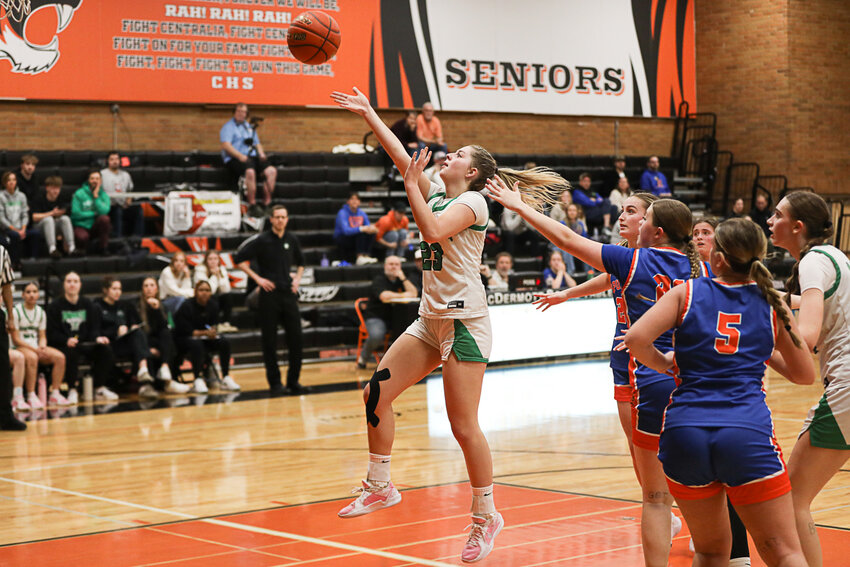 Tumwater's Sydney Sumrok shoots an open underhand layup during Tumwater's 57-50 loss against Columbia River in a 2A District 4 Elimination Game at Centralia High School on Feb. 17.