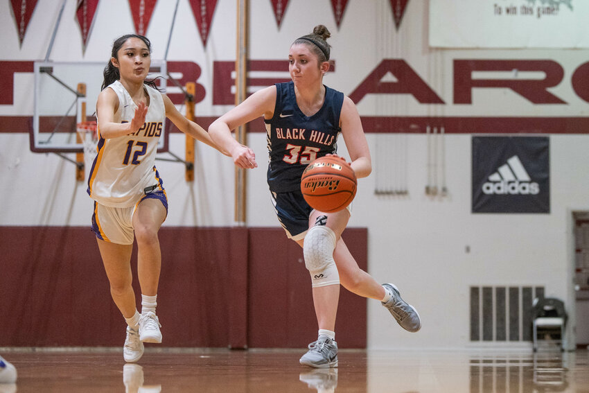 Black Hills&rsquo; Kiley McMahon looks to pass during  the Wolves&rsquo; district semifinal loss to Columbia River at W.F. West High School on Monday, Feb. 17.