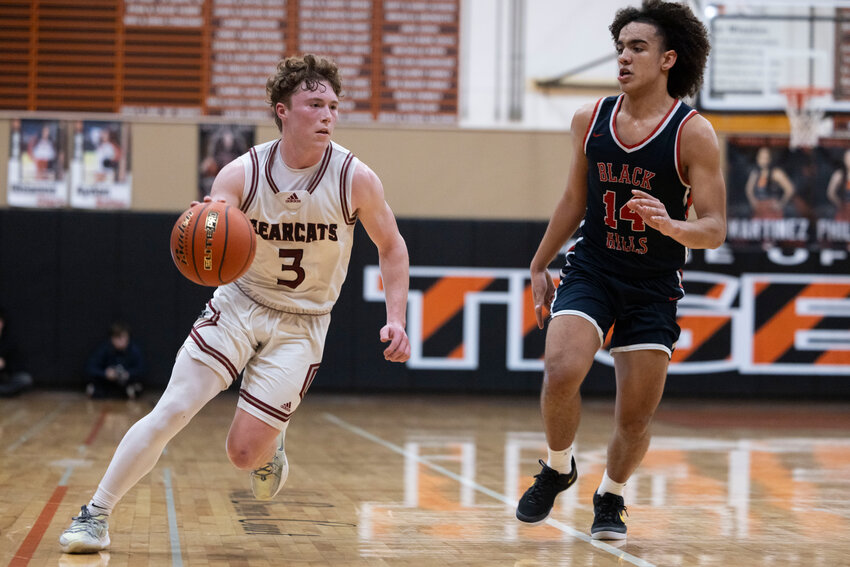 W.F. West's Ross Kelley (3) dribbles the ball during a boys 2A District 4 Tournament elimination game at Centralia High School on Tuesday, Feb. 18.
