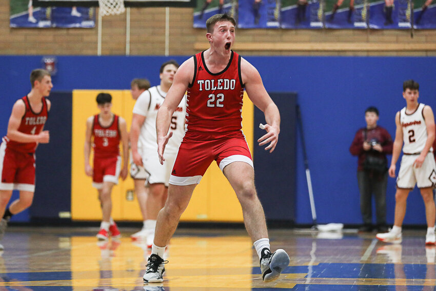 Toledo's Cooper Fallon celebrates after a big play during Toledo's 55-42 win over Napavine in a 2B District 4 Semifinal at Kelso High School on Feb. 19.